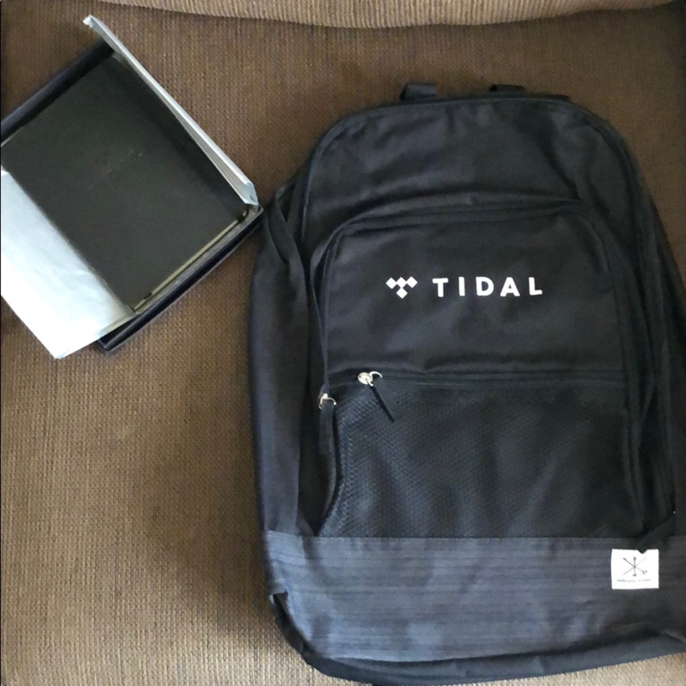 Tidal Branded backpack and Essential Journal